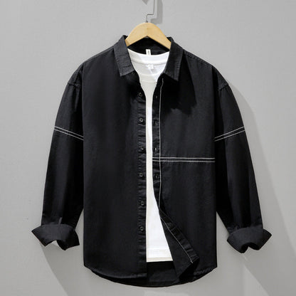 Crisp white men's relaxed fit shirt for versatile everyday wear, ideal for smart casual men's fashion.