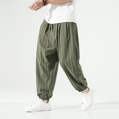 Side profile of men's casual linen blend harem joggers, offering ultimate comfort and relaxed fit.