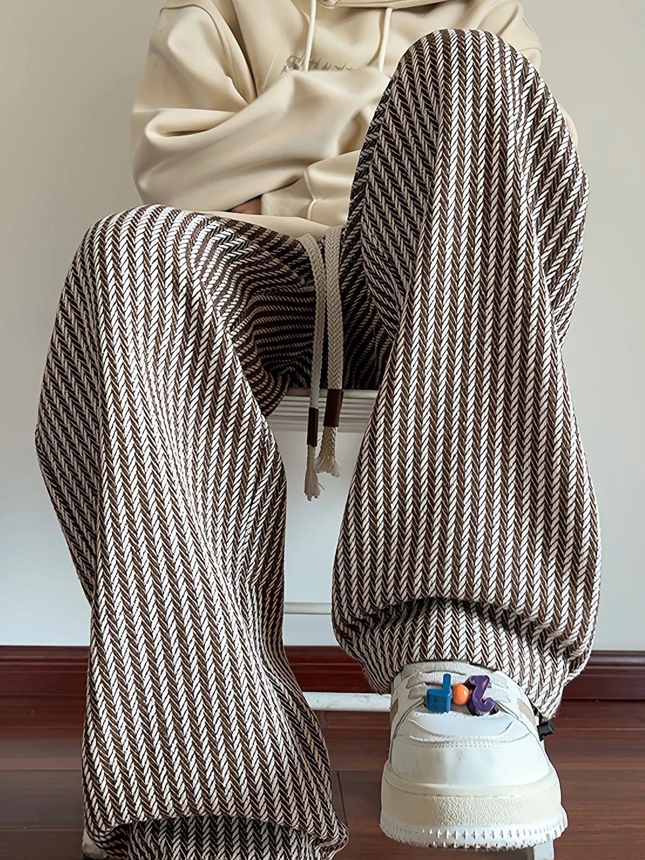 Men's relaxed fit herringbone lounge pants with drawstring waist for ultimate comfort and casual style.