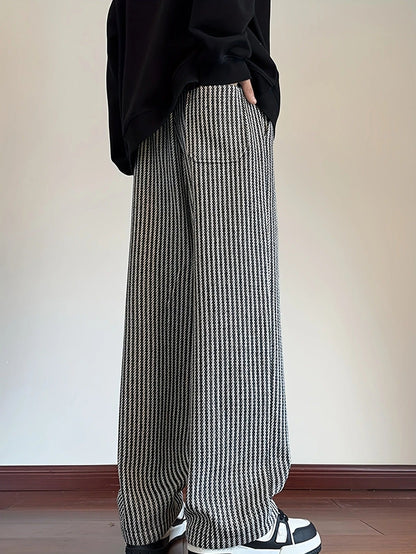 Men's apparel: relaxed fit herringbone casual lounge pants, designed for comfort and modern style.