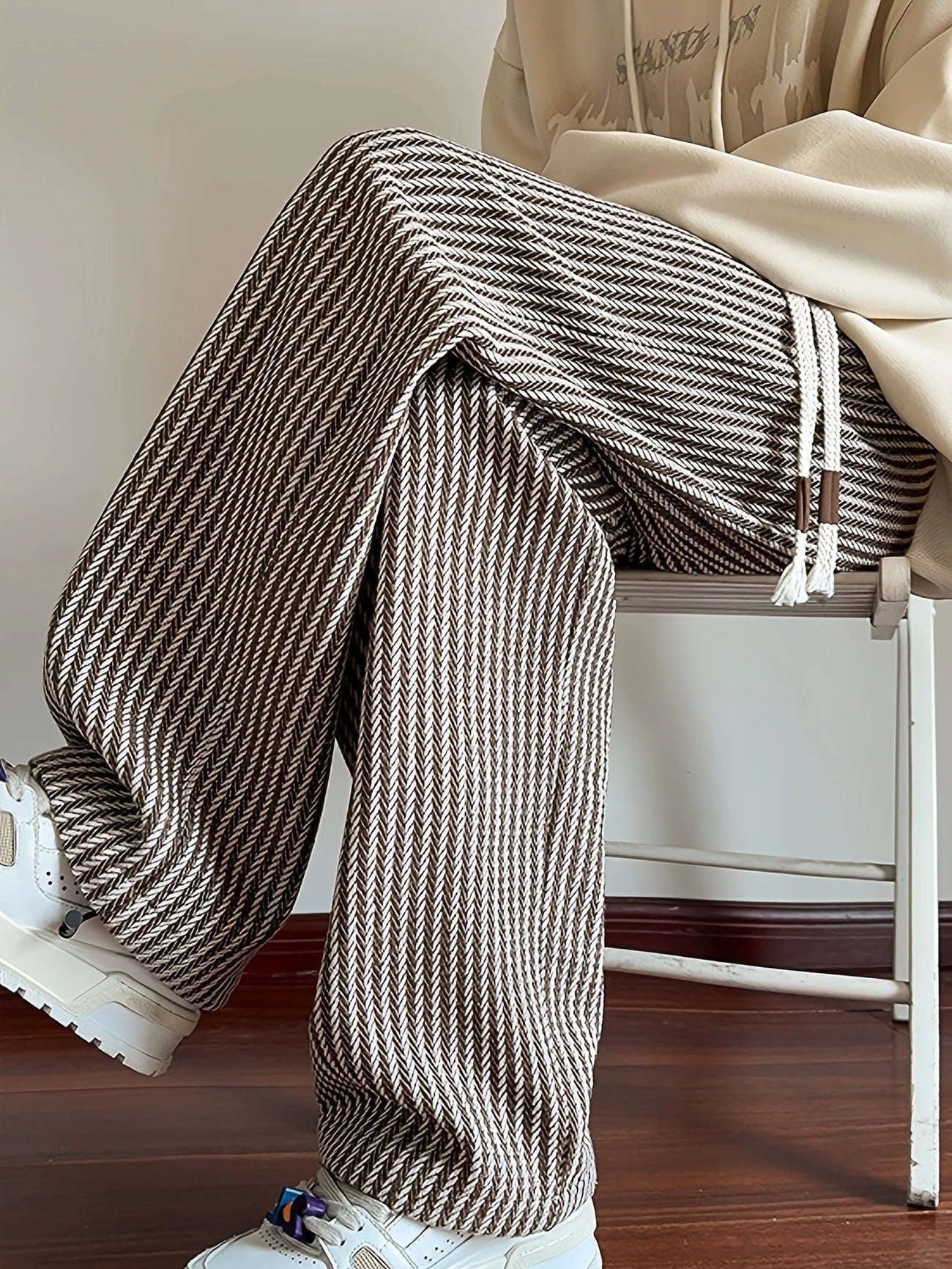 Comfortable men's relaxed fit brown herringbone design lounge pants, perfect for streetwear and casual wear.