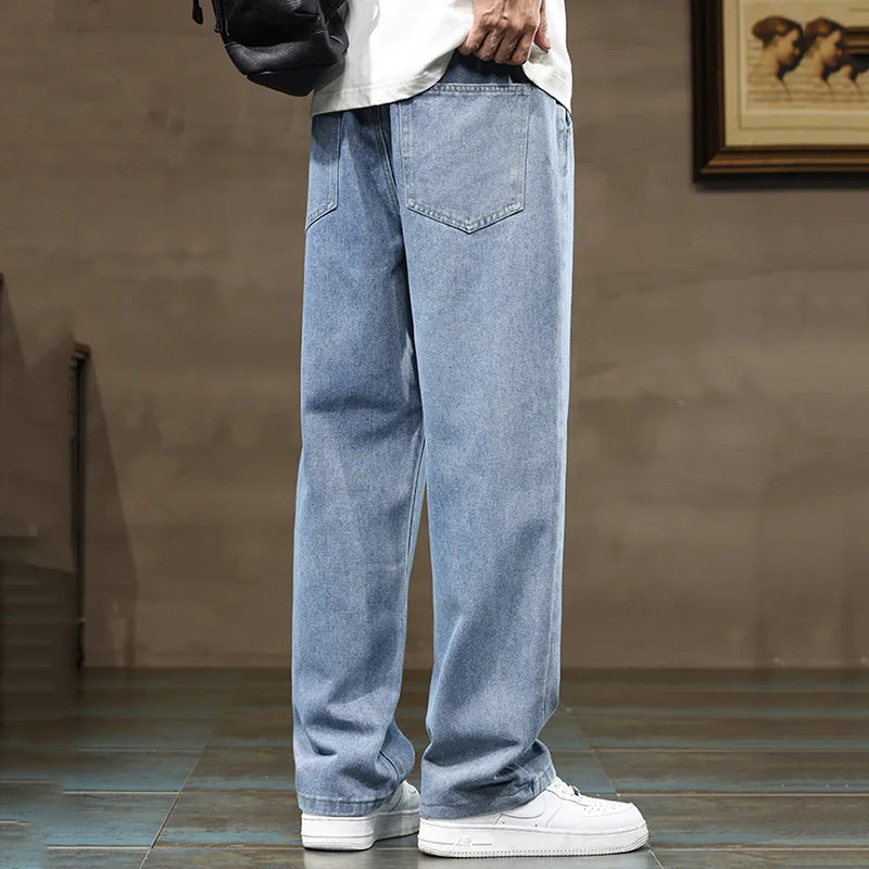 Versatile indigo blue men's relaxed fit denim joggers, combining style and ultimate comfort for daily apparel.