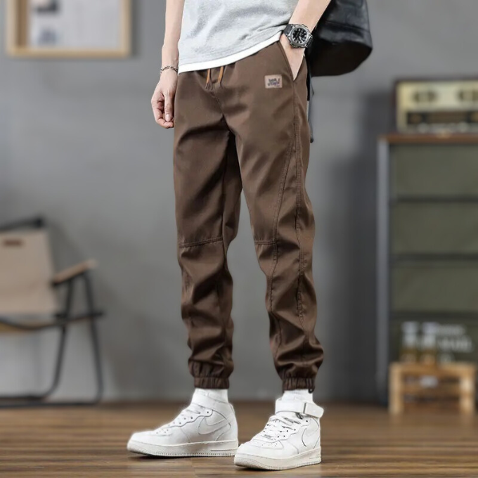 Comfortable men's relaxed fit joggers with tapered leg and drawstring. Versatile for athletic, lounge, or casual wear.
