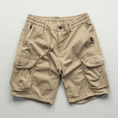 Practical men's army green cargo shorts, relaxed fit for versatile casual & outdoor summer adventures.