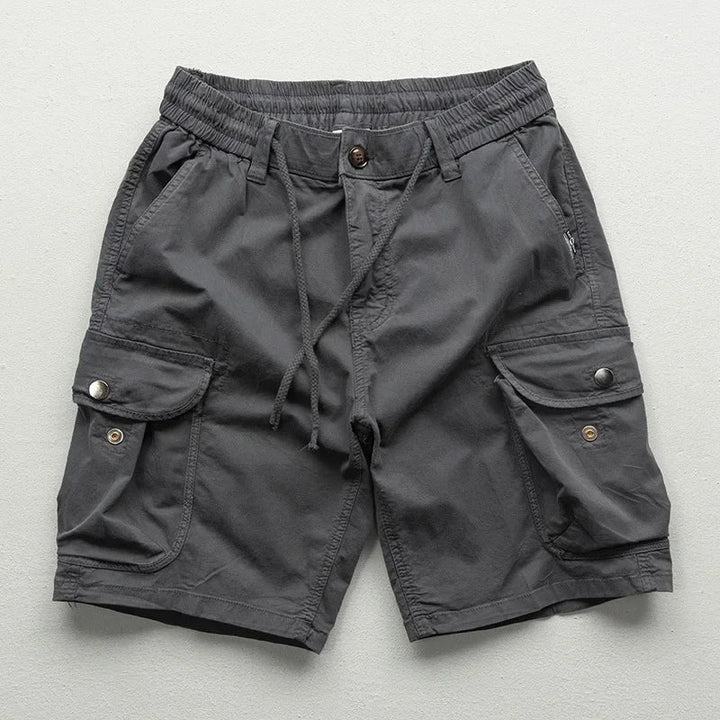 Versatile black men's relaxed fit cargo shorts, ideal for outdoor activities & casual summer style.