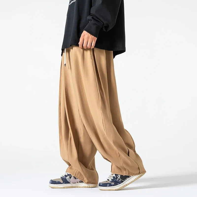 Comfortable black men's relaxed fit pants. Versatile casual wear, soft touch fabric for everyday menswear.