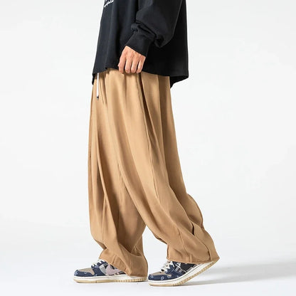 Comfortable black men's relaxed fit pants. Versatile casual wear, soft touch fabric for everyday menswear.
