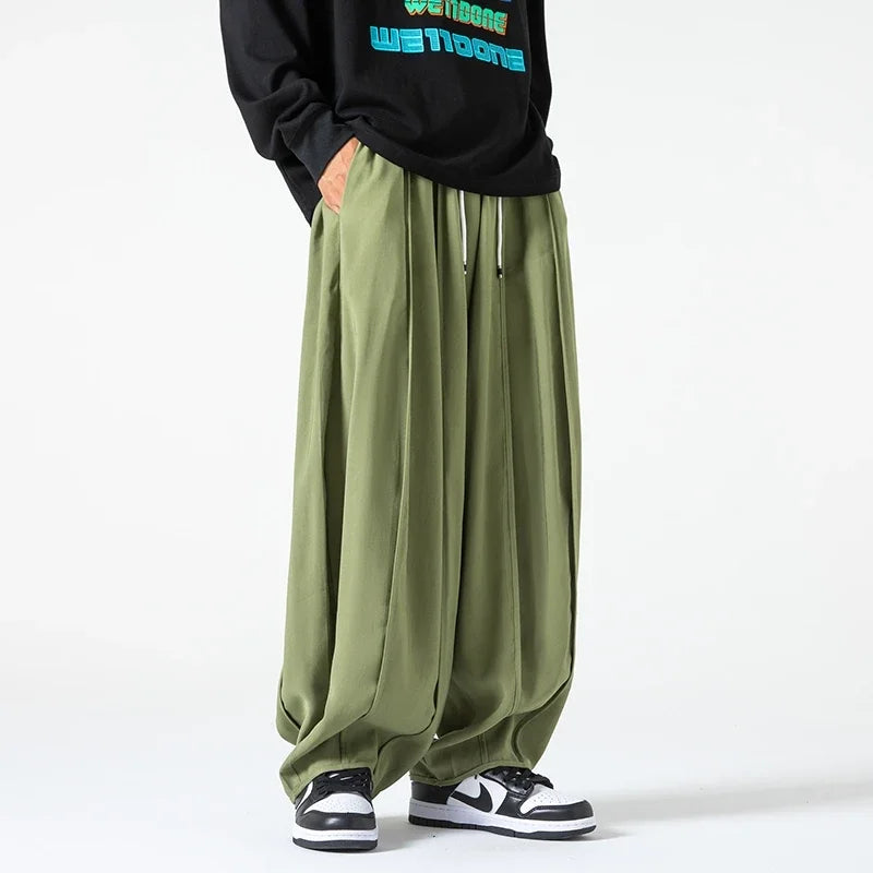 Relaxed fit men's pants, ultimate comfort. Versatile for casual everyday wear. Khaki, black, & green options.