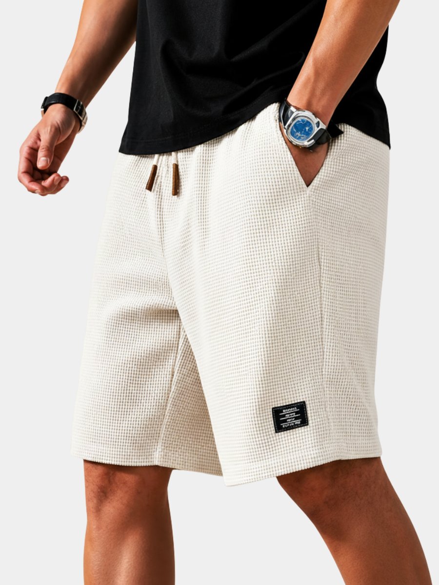 Men's relaxed fit lightweight summer shorts with drawstring for ultimate comfort.