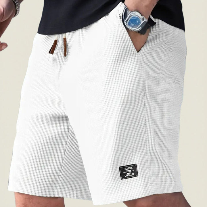 Ultra-comfortable men's lightweight summer shorts, relaxed fit, perfect for warm weather.