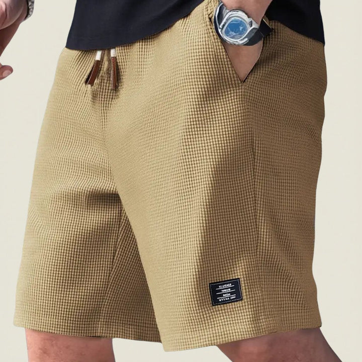 Stylish men's summer comfort shorts, ideal lightweight apparel for warm weather.
