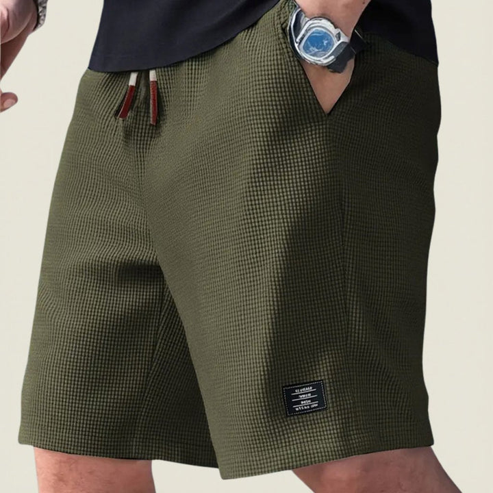 Versatile men's lightweight shorts, relaxed fit for ultimate summer comfort and style.