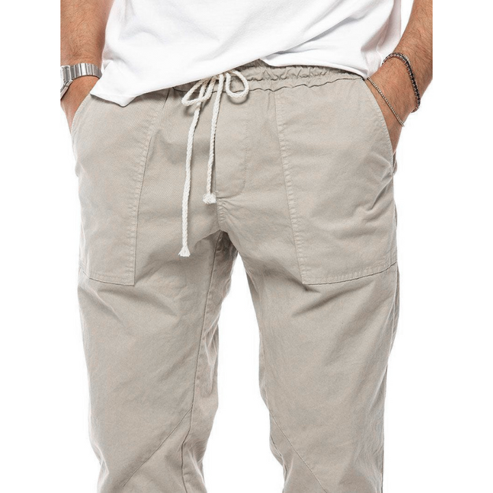 Lightweight men's linen blend joggers, relaxed fit summer pants, breathable for warm weather fashion.