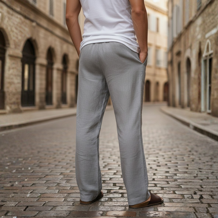 Breathable men's baggy linen trousers with drawstring waist, perfect for casual summer wear.