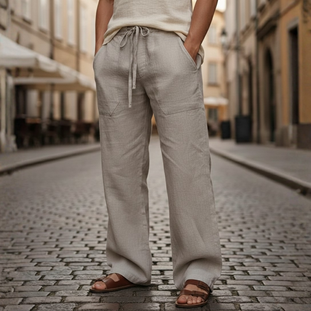 Stylish men's casual linen trousers with drawstring waist, relaxed fit for summer days.