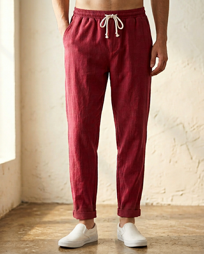 Breathable men's linen pants, relaxed fit, essential for summer comfort and style.