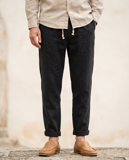 Light gray men's linen trousers, relaxed fit, comfort for summer fashion.