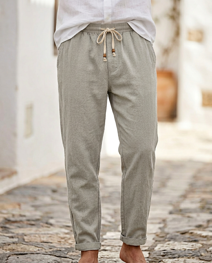 Relaxed fit men's natural linen trousers, breathable fabric, ultimate summer comfort.