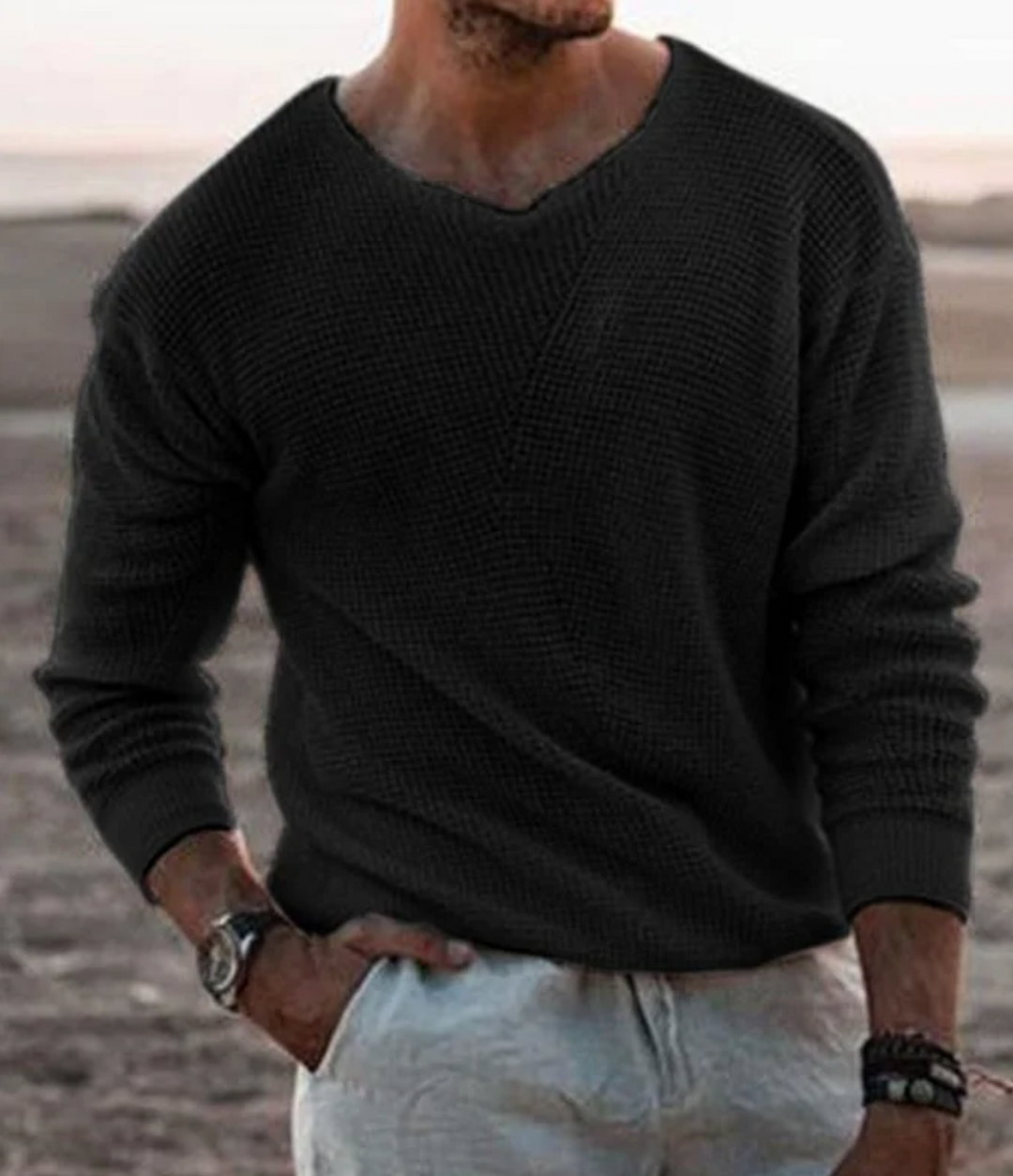 Cozy men's long-sleeve V-neck sweater, relaxed fit. Essential winter clothing for casual comfort.