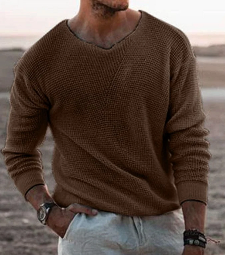 Men's long-sleeve relaxed fit V-neck jumper. A comfortable and essential casual top.
