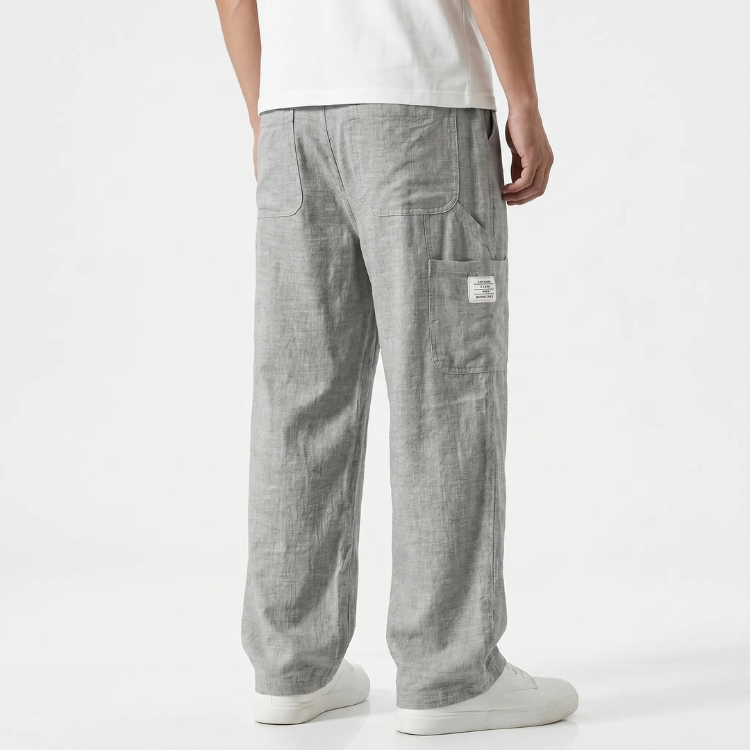 Men's casual cargo pants, relaxed loose fit, straight leg with practical pockets. Drawstring waist for comfort.