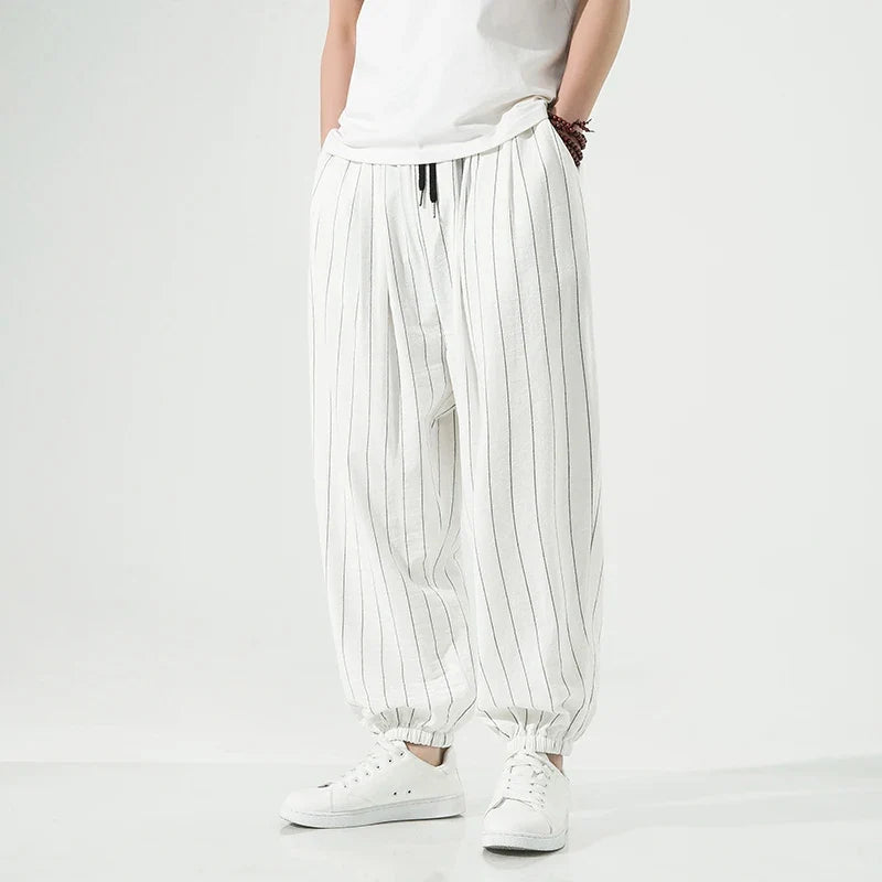 Versatile men's relaxed pants, designed for ultimate comfort and everyday style with a modern elastic cuff.