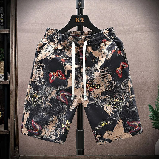 Men's relaxed fit patterned shorts with drawstring for casual summer comfort.