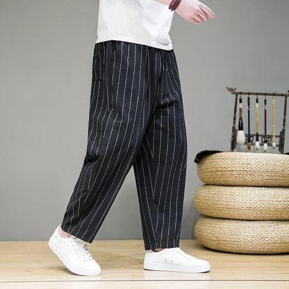 Men's comfortable pinstripe lounge pants with adjustable drawstring waist and relaxed wide leg design.