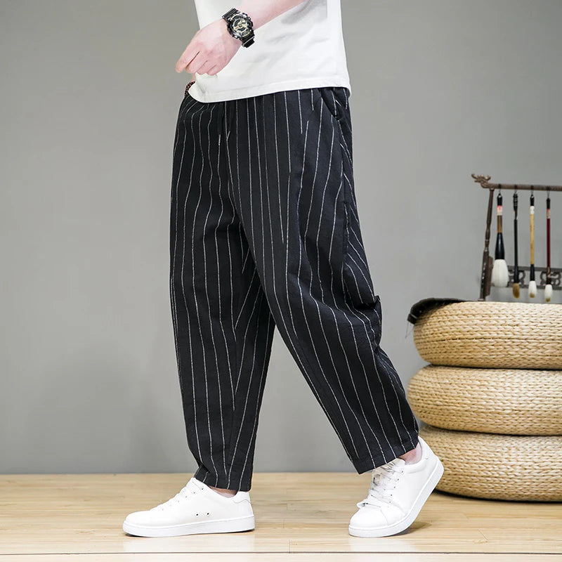 Stylish men's pinstripe lounge pants for casual everyday wear. Relaxed fit, comfortable, modern apparel.