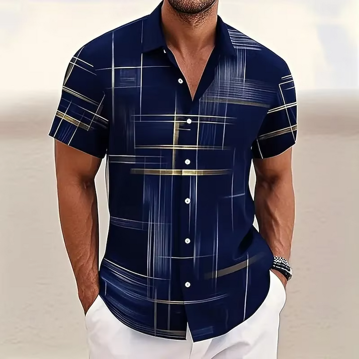 Men's relaxed fit polo shirt with a modern geometric print. Perfect short sleeve top for summer casual wear.