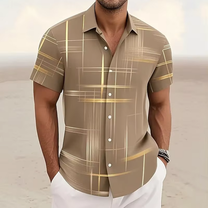 Vibrant men's geometric pattern polo shirt, a stylish and comfortable short sleeve top for resort wear.