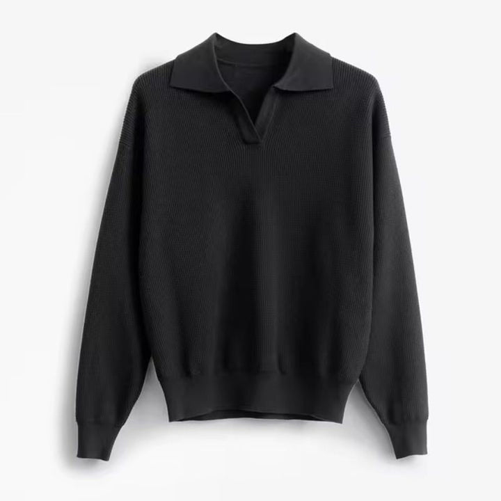 Stylish men's pullover sweater with a relaxed fit and unique collar detail. Great for fall and winter fashion.