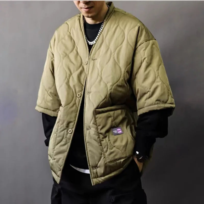 Casual men's quilted bomber jacket for relaxed fit urban style, great as a versatile fall/spring outerwear piece.