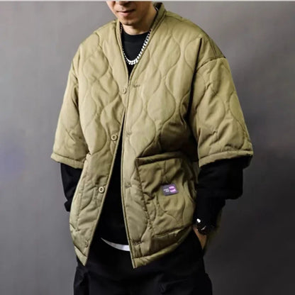 Casual men's quilted bomber jacket for relaxed fit urban style, great as a versatile fall/spring outerwear piece.
