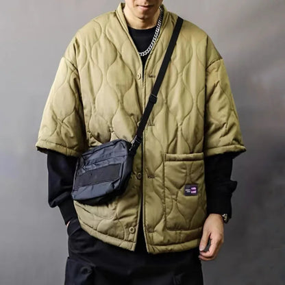Durable men's quilted button-up bomber jacket, relaxed fit, perfect for everyday urban fashion & fall adventures.