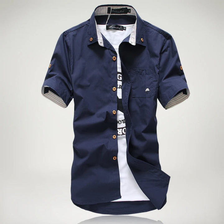 Stylish men's casual relaxed fit short sleeve button-up cotton shirt, ideal for everyday wear.