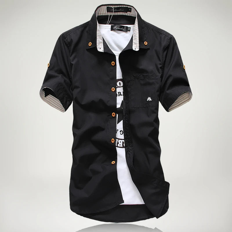 Close-up of a men's relaxed fit short sleeve button-up cotton shirt, highlighting breathable fabric.