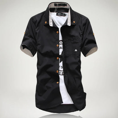 Close-up of a men's relaxed fit short sleeve button-up cotton shirt, highlighting breathable fabric.