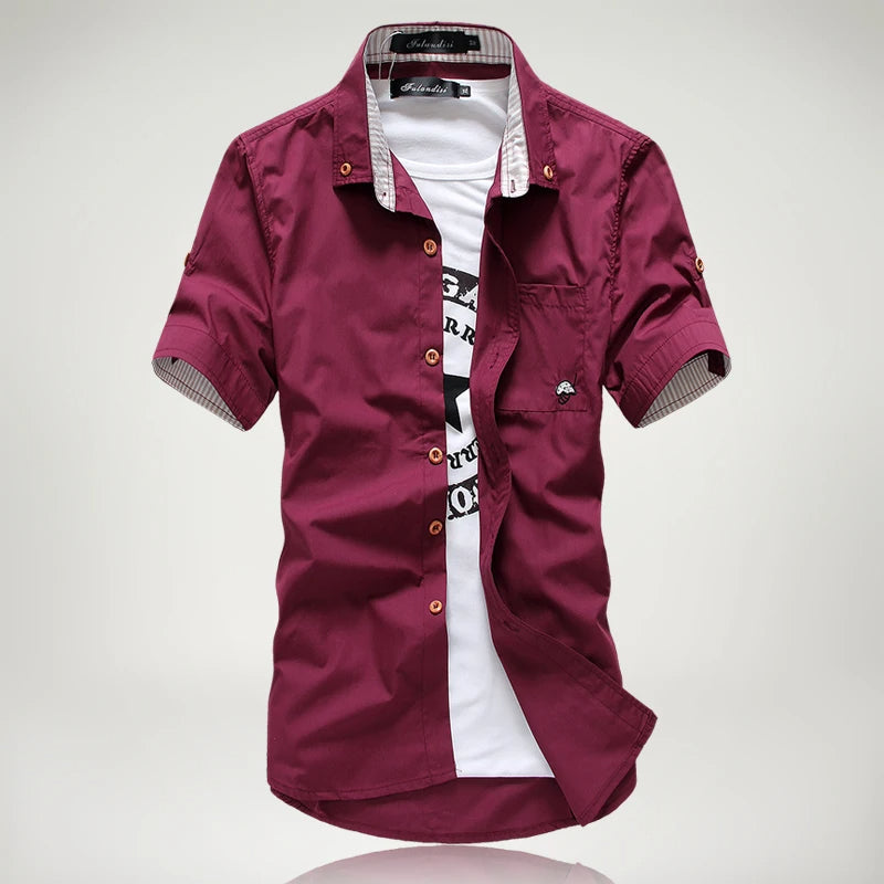 Casual men's short sleeve button-up shirt, relaxed fit, cotton fabric; stylish, versatile summer top.