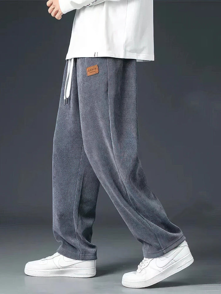 Stylish black men's relaxed straight-leg pants, versatile for everyday fashion & comfortable casual wear.