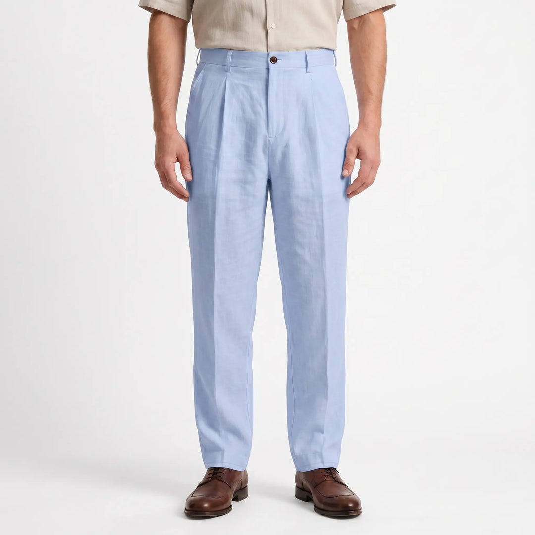 Close-up of men's pleated straight leg pants, showing fabric texture and detail for a smart casual look.
