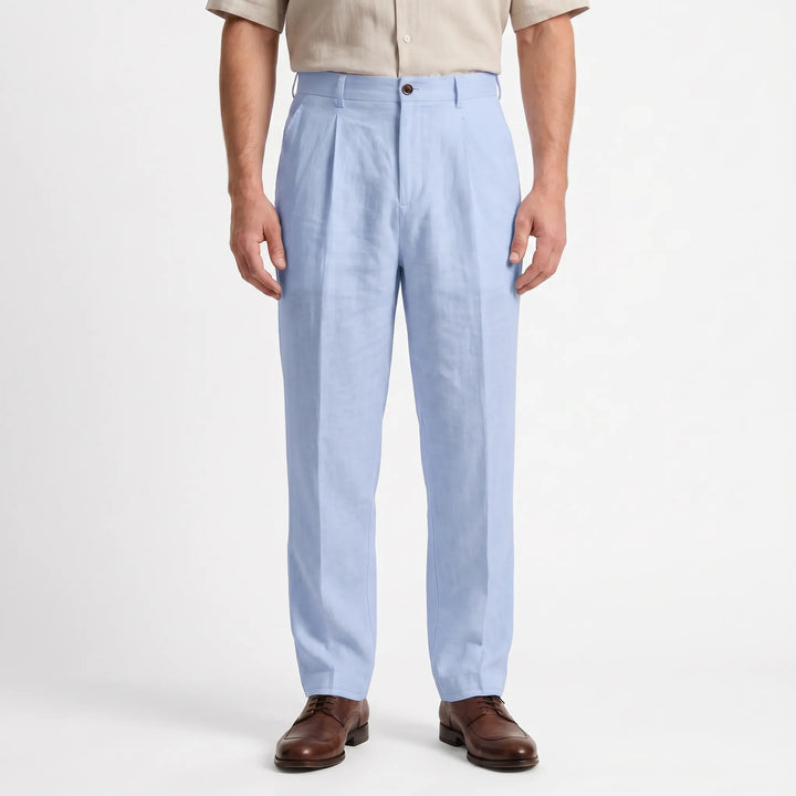 Close-up of men's pleated straight leg pants, showing fabric texture and detail for a smart casual look.
