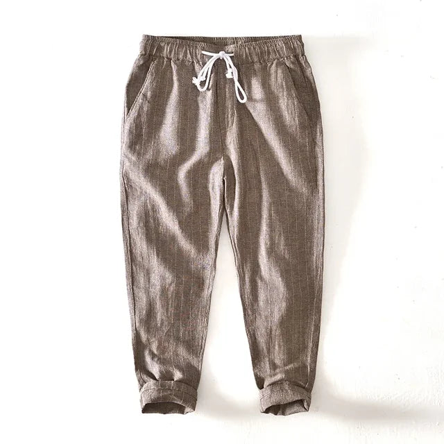 Relaxed fit men's striped drawstring pants in khaki, offering ultimate comfort for casual and summer outfits.