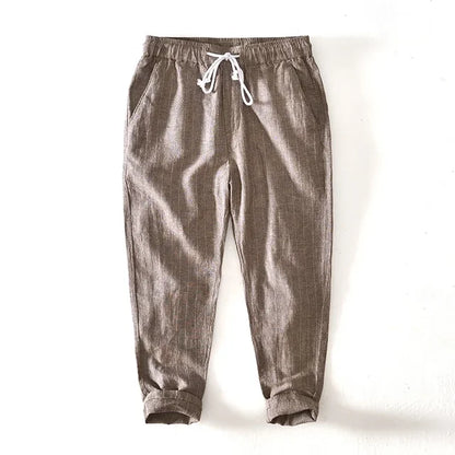 Relaxed fit men's striped drawstring pants in khaki, offering ultimate comfort for casual and summer outfits.