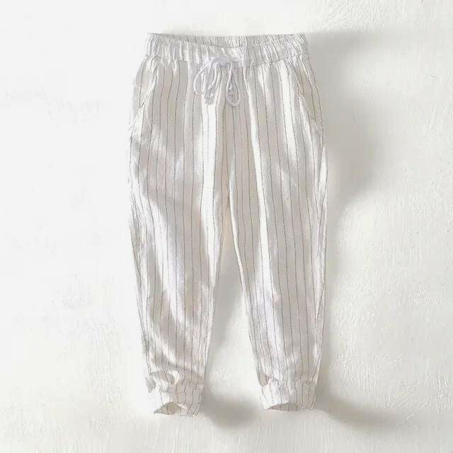 Effortlessly stylish men's relaxed striped pants, perfect for comfortable summer wear and casual fashion looks.