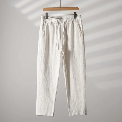 Detailed view of men's relaxed fit summer casual pants, highlighting comfortable fabric & versatile design.