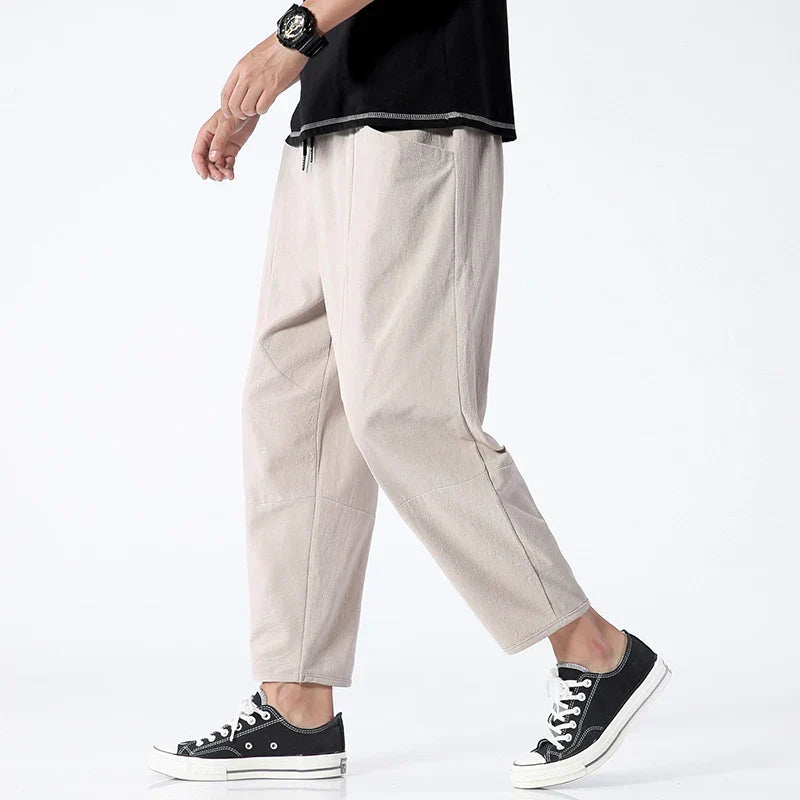 Casual men's tapered cropped pants, offering a relaxed fit and modern style for ultimate comfort.