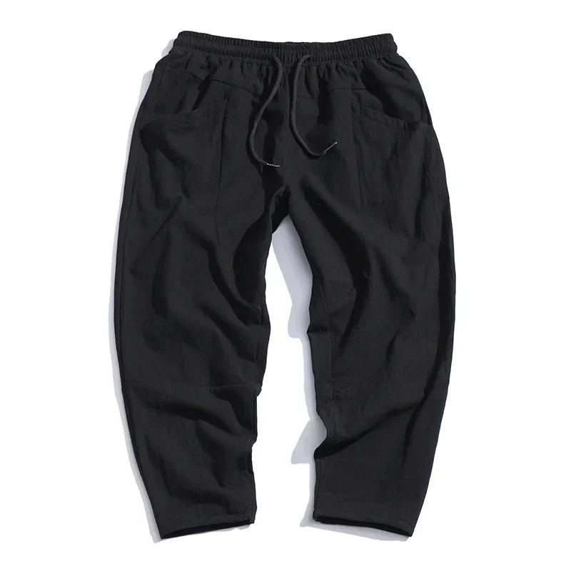 Everyday men's casual pants: relaxed tapered cropped design, lightweight & comfortable for any occasion.