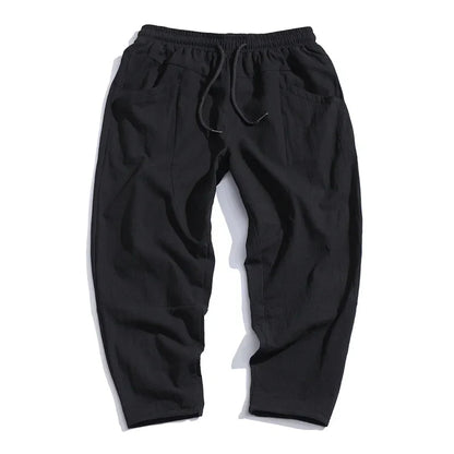 Everyday men's casual pants: relaxed tapered cropped design, lightweight & comfortable for any occasion.