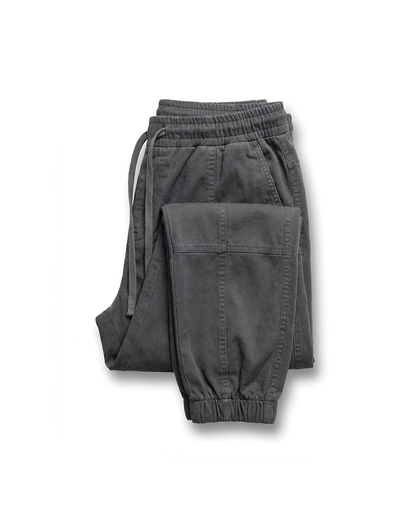 Men's relaxed fit tapered leg joggers with drawstring waist, ideal for casual wear & comfort.